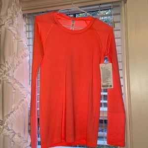 BRAND NEW WITH TAGS SUNSET COLORED SWIFTLY TECH LONG SLEEVE! SIZE 6 LULULEMON